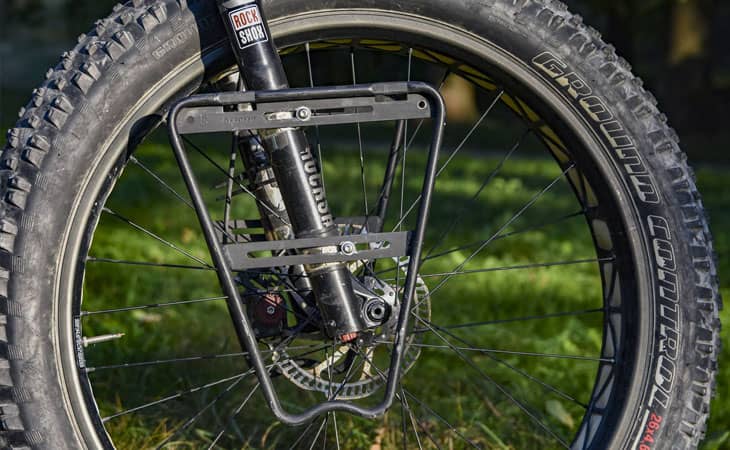 How to mount a front rack on a bicycle fork without pivots?